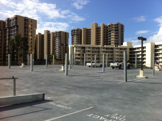 Cars parked on the roof parking of a building