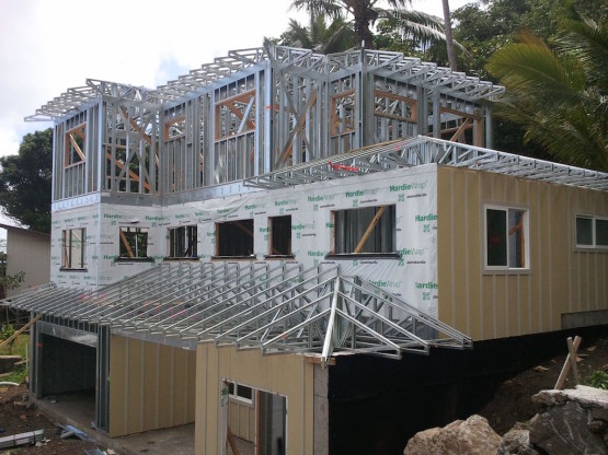 Steel railings used to construct the roof of a house