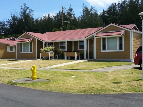 Brown colored house with red roof