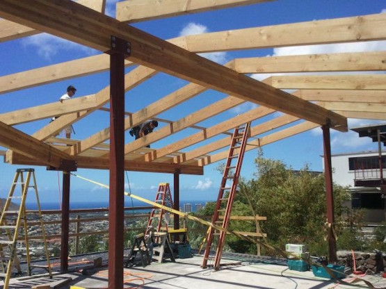 A wooden house under construction