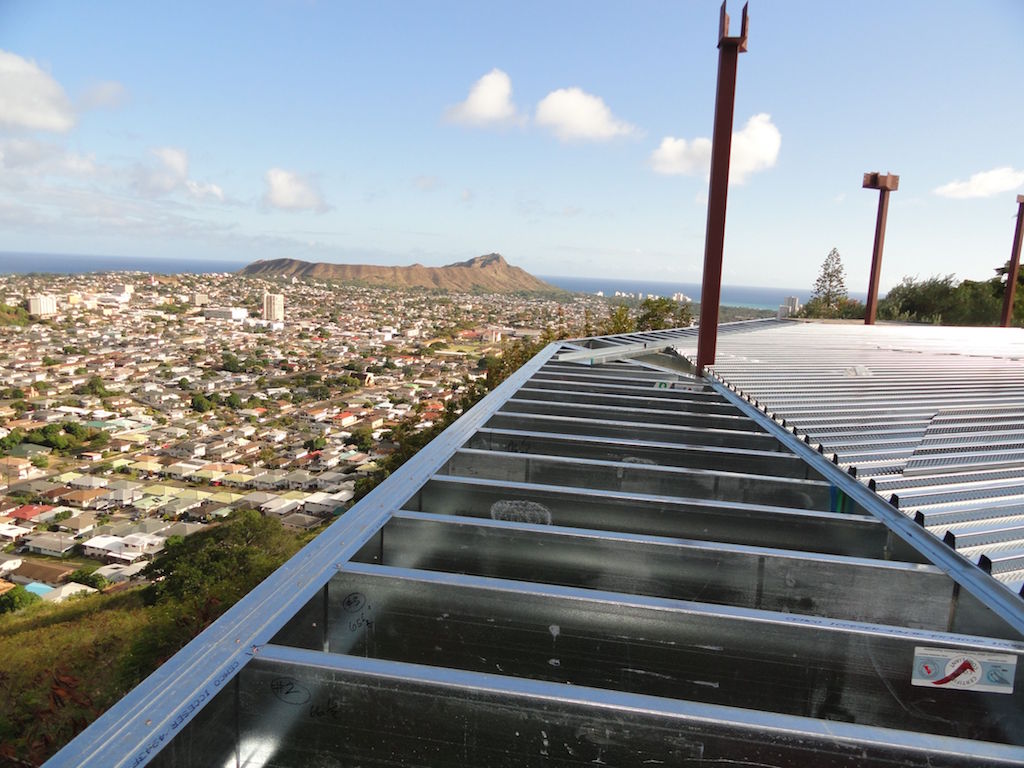 Glass plated rooftop with metal linings