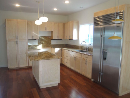 Brown colored Wooden cabinets inside a house