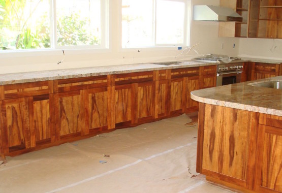 Brown colored Wooden cabinets inside a house