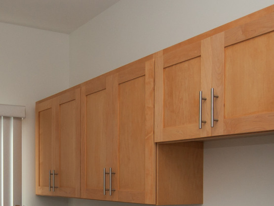 Brown colored cabinets inside a house