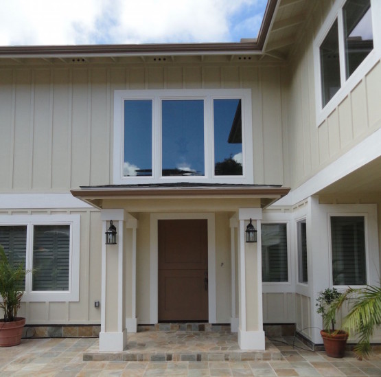 Brown colored door leading inside a house