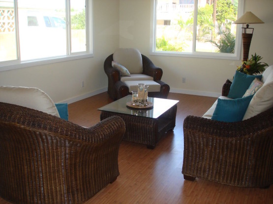 Interior of a house with wooden sofa with white cushions