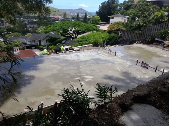 Wet cement aligned near the slope