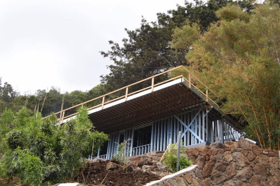A house near the slope under construction