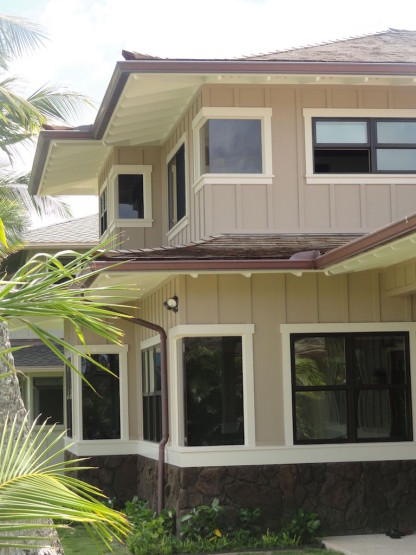 Black tinted windows on a lavish villa